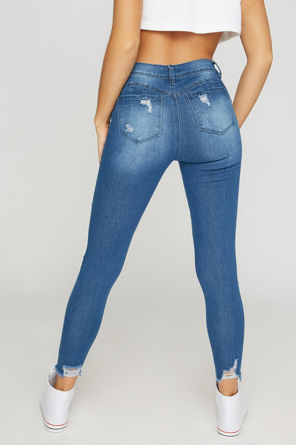 Women Jean remonte-fesses court d'aspect usé avec franges Bleu moyen