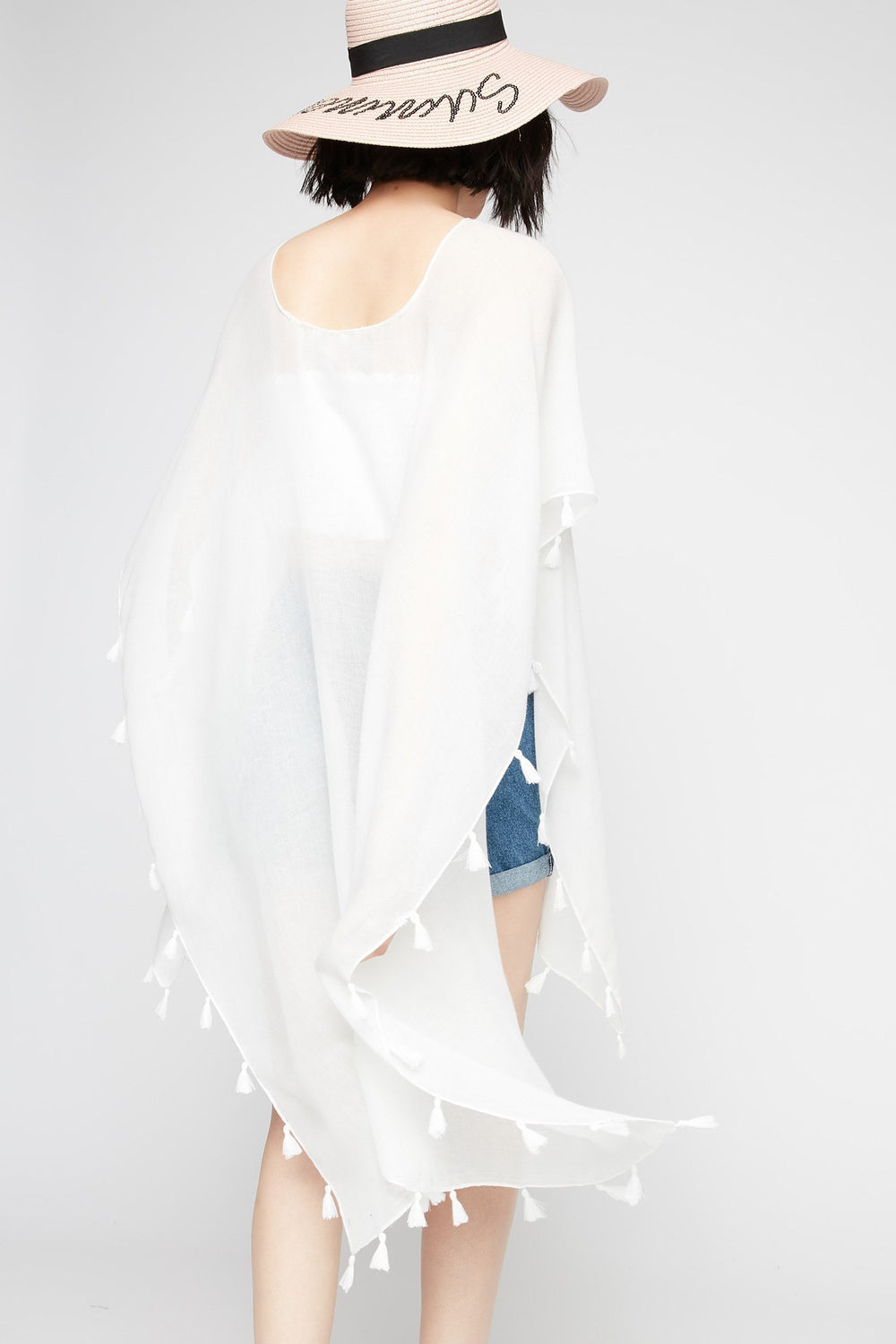 Women Poncho asymétrique avec pampilles Ivoire
