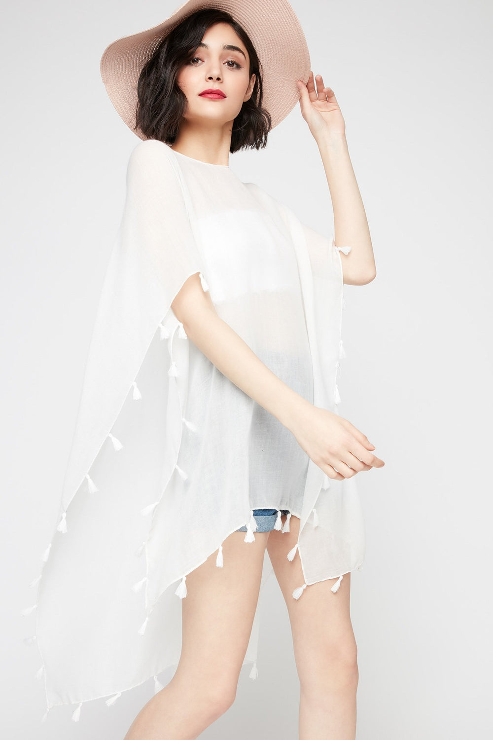Women High-Low Tassel Poncho Ivory
